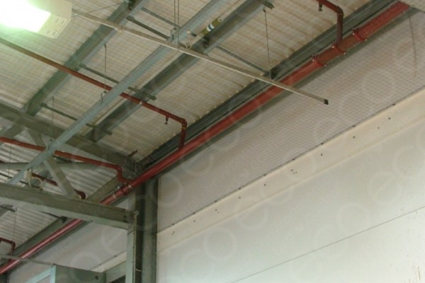 Pigeon Netting Installed to Encase  Ceiling Beams, Wiring, and Lighting