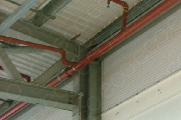 Netting Installed to the Perimeter of Warehouse Ceiling