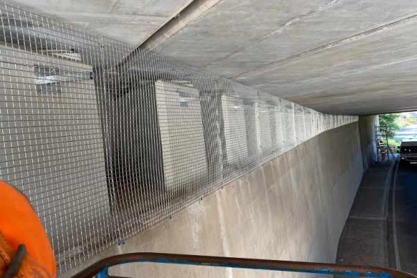 Bird Mesh Installed to Cover Open Ledges Under Bridge
