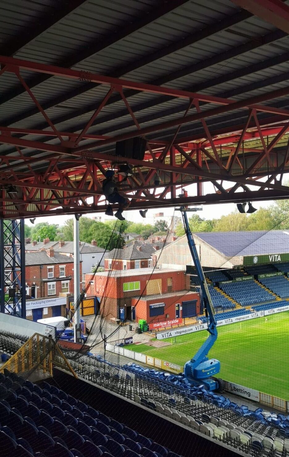 Bird netting to Stadium stand combining rope & MEWP access